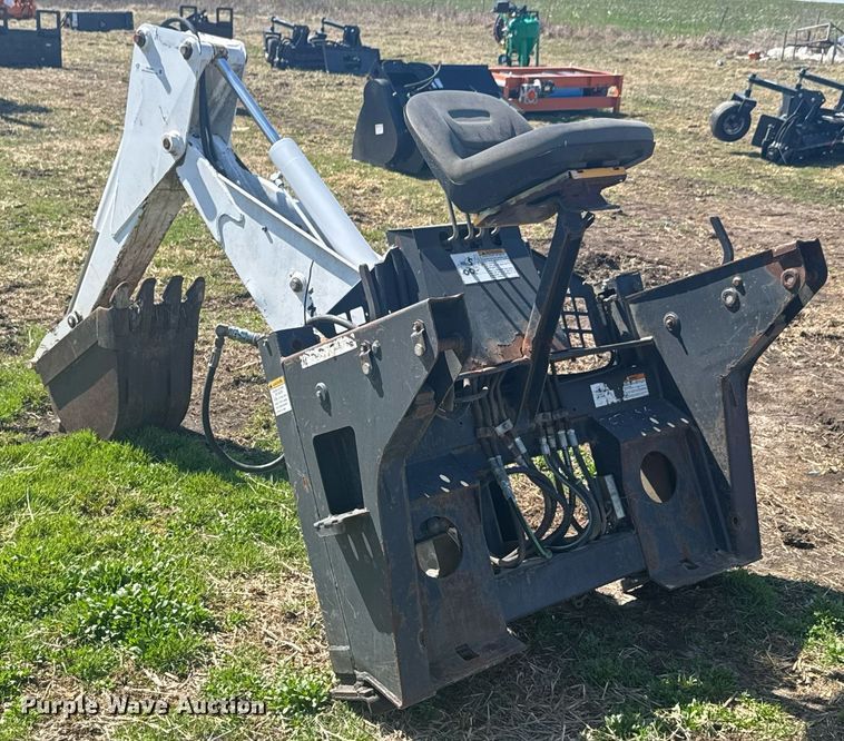 image for item DO0667 Bobcat 709 skid steer backhoe