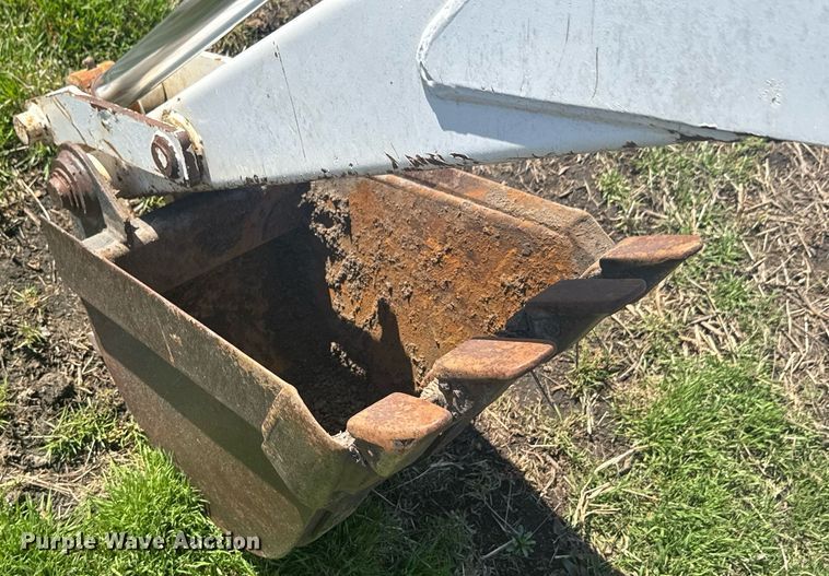 image for item DO0667 Bobcat 709 skid steer backhoe