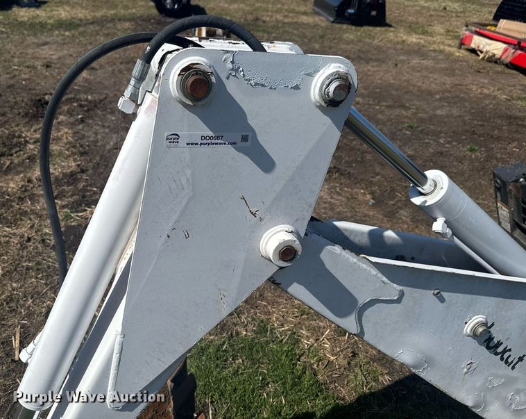 image for item DO0667 Bobcat 709 skid steer backhoe