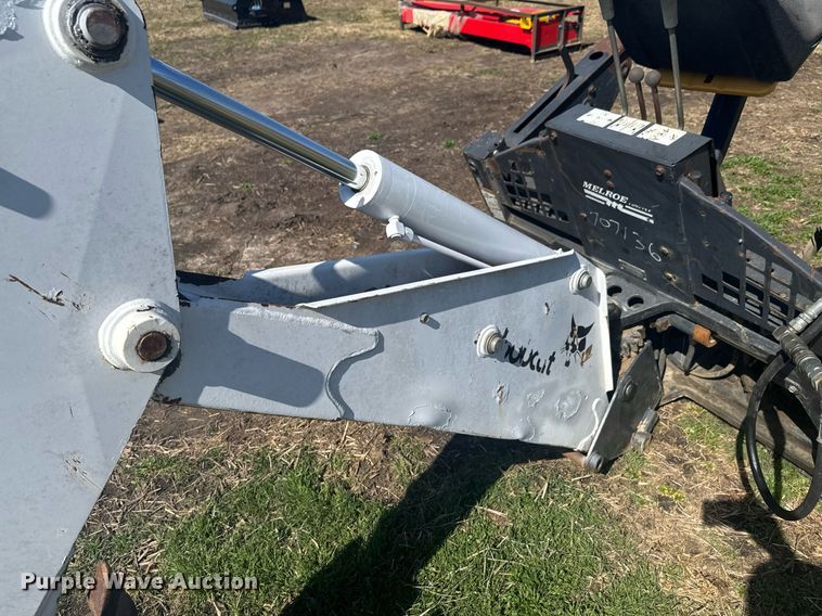 image for item DO0667 Bobcat 709 skid steer backhoe