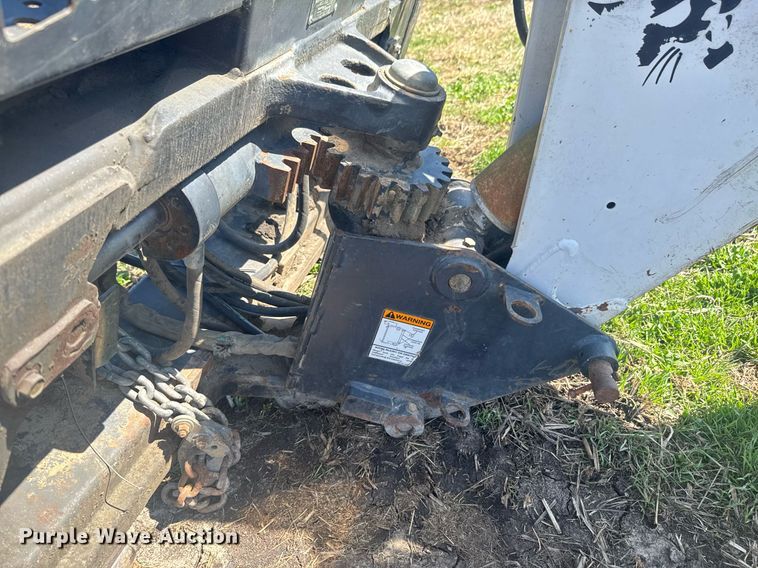 image for item DO0667 Bobcat 709 skid steer backhoe