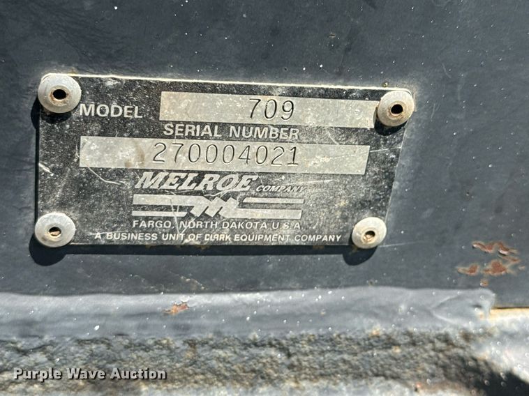 image for item DO0667 Bobcat 709 skid steer backhoe