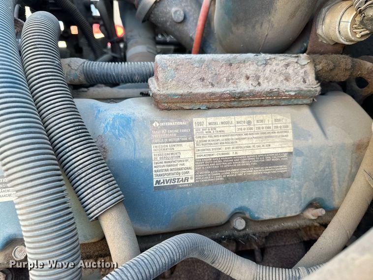 image for item DV0670 1998 International 4700 flatbed truck