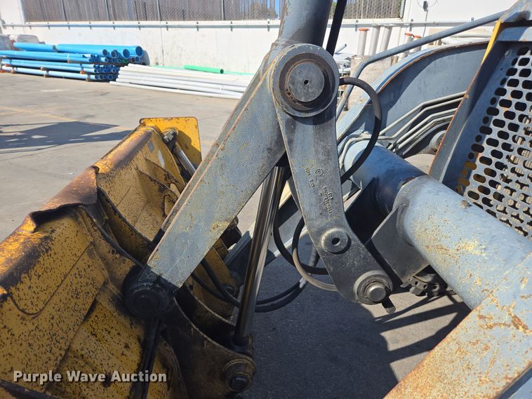 image for item EC0882 2010 John Deere 210LJ landscape tractor