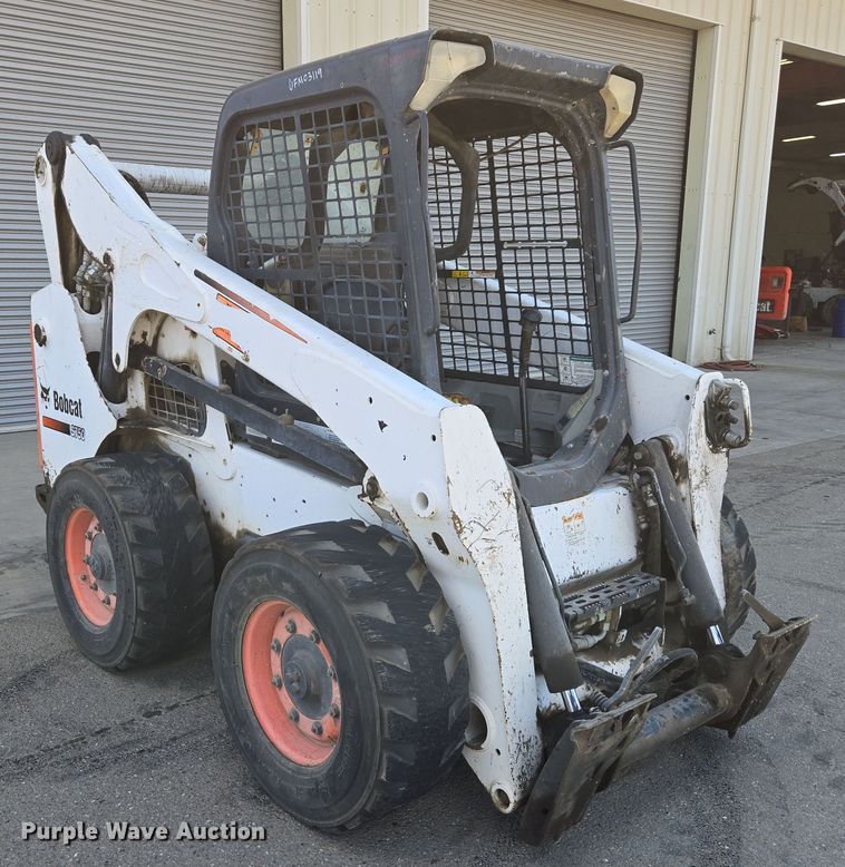 image for item EC0906 Bobcat S750 skid steer loader