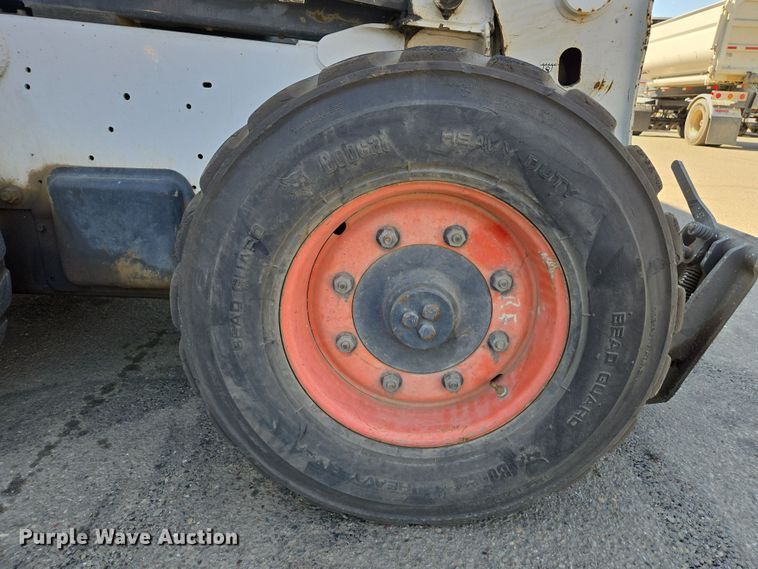 image for item EC0906 Bobcat S750 skid steer loader