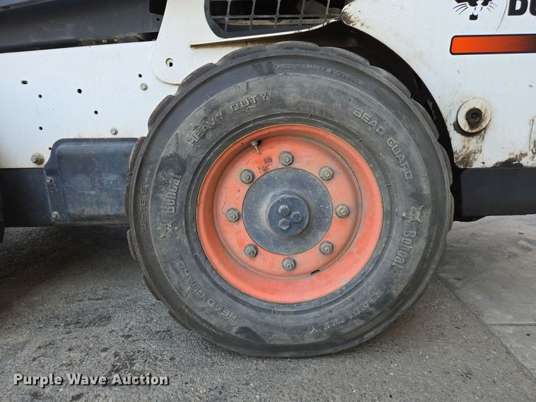 image for item EC0906 Bobcat S750 skid steer loader