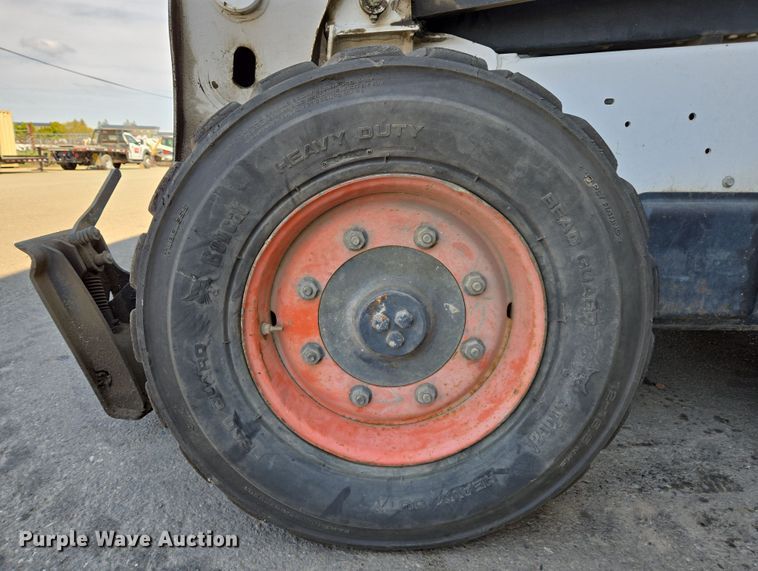 image for item EC0906 Bobcat S750 skid steer loader