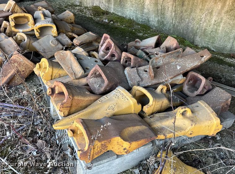 image for item EC4090 (2) pallets of Caterpillar bucket teeth