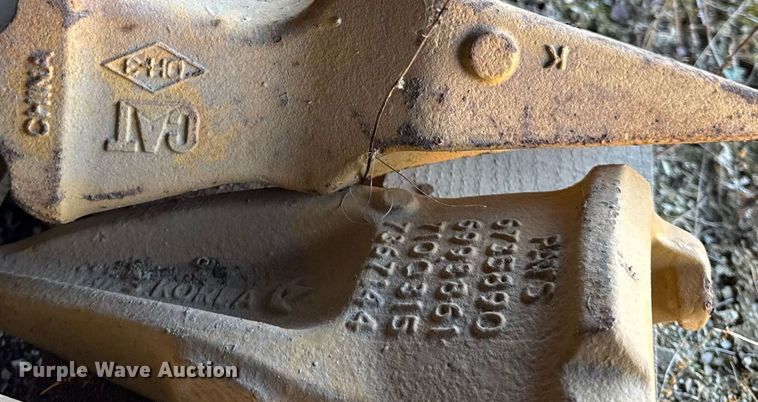 image for item EC4090 (2) pallets of Caterpillar bucket teeth