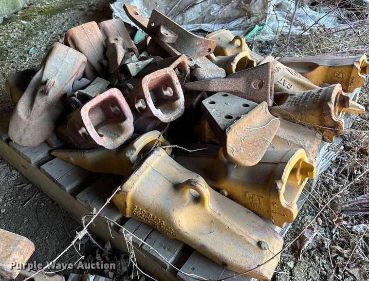 image for item EC4090 (2) pallets of Caterpillar bucket teeth
