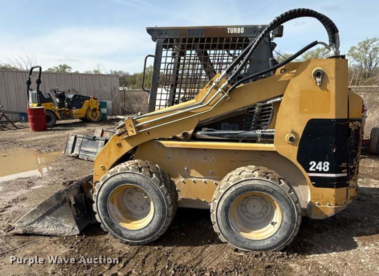 image for item ED4175 2002 Caterpillar 248 skid steer loader