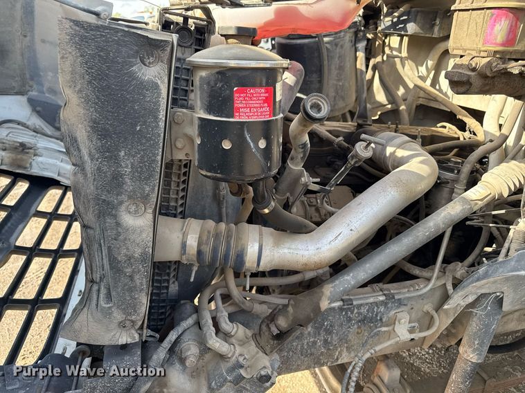 image for item ED4178 2000 Ford F750 Super Duty XL flatbed truck