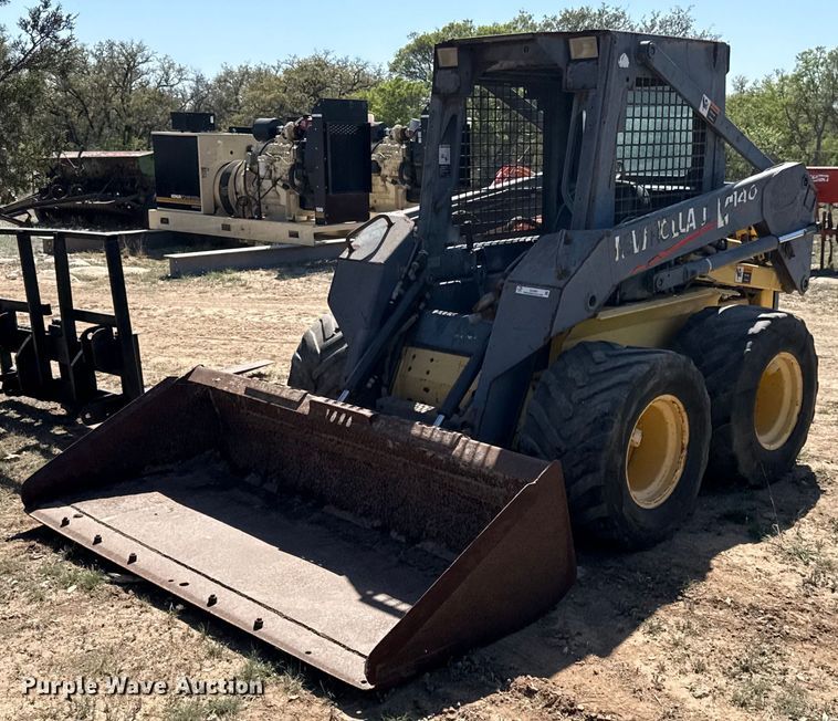 image for item EJ3561 2000 New Holland LS140 skid steer loader