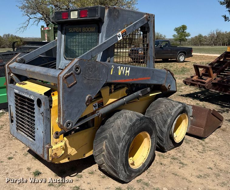 image for item EJ3561 2000 New Holland LS140 skid steer loader