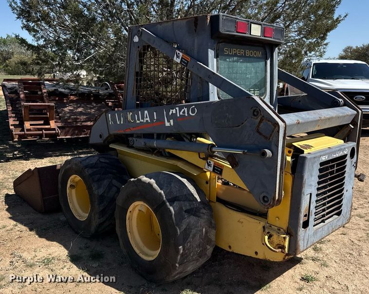 image for item EJ3561 2000 New Holland LS140 skid steer loader