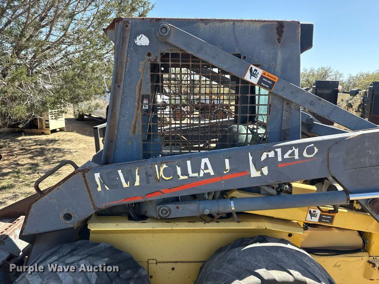 image for item EJ3561 2000 New Holland LS140 skid steer loader