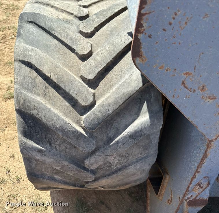 image for item EJ3561 2000 New Holland LS140 skid steer loader