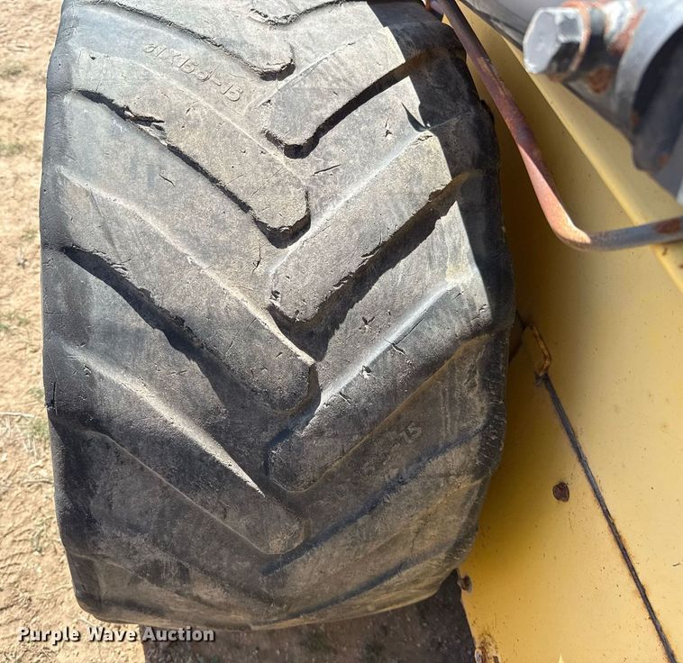 image for item EJ3561 2000 New Holland LS140 skid steer loader