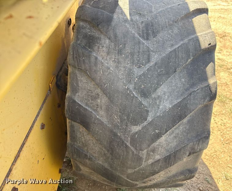 image for item EJ3561 2000 New Holland LS140 skid steer loader