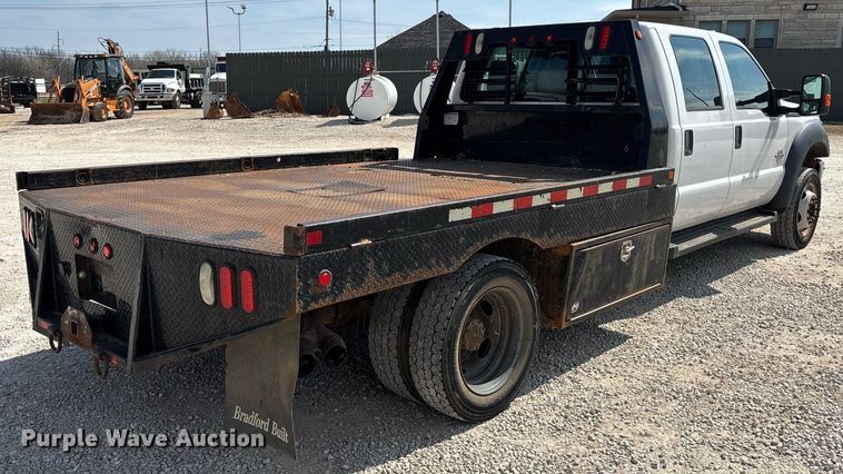 image for item EM0033 2013 Ford F550 Super Duty Crew Cab flatbed truck
