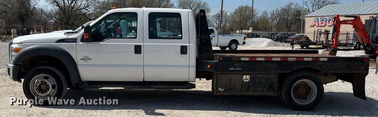 image for item EM0033 2013 Ford F550 Super Duty Crew Cab flatbed truck