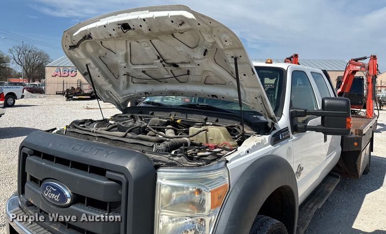 image for item EM0033 2013 Ford F550 Super Duty Crew Cab flatbed truck