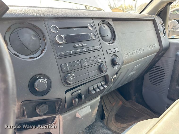 image for item EM0033 2013 Ford F550 Super Duty Crew Cab flatbed truck