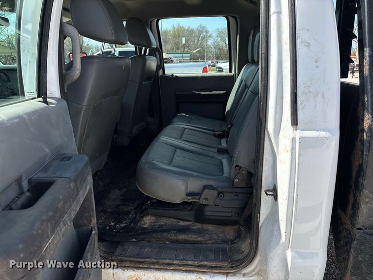 image for item EM0033 2013 Ford F550 Super Duty Crew Cab flatbed truck