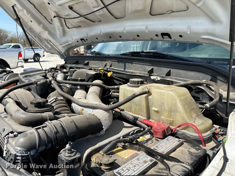 image for item EM0033 2013 Ford F550 Super Duty Crew Cab flatbed truck