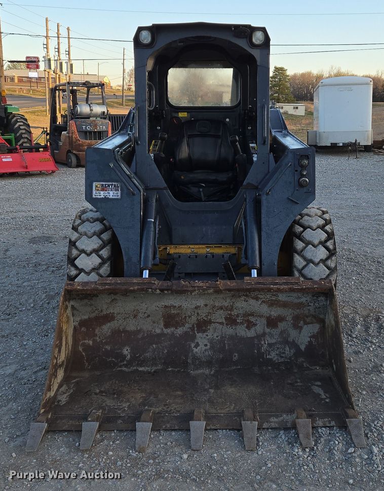 image for item EN8808 2017 John Deere 320E skid steer loader