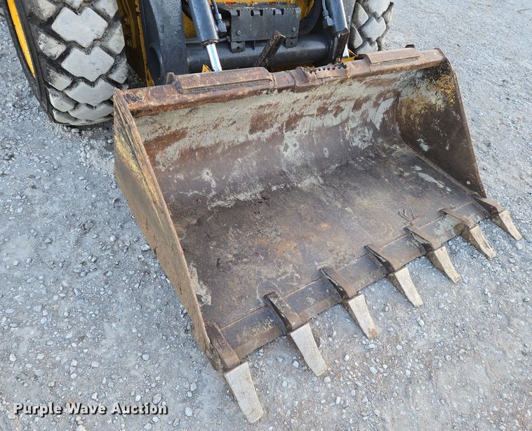 image for item EN8808 2017 John Deere 320E skid steer loader