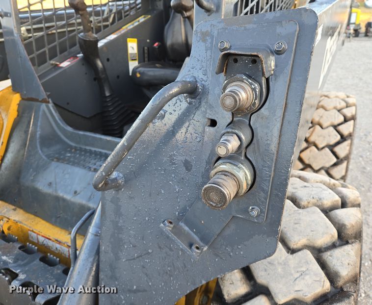 image for item EN8808 2017 John Deere 320E skid steer loader