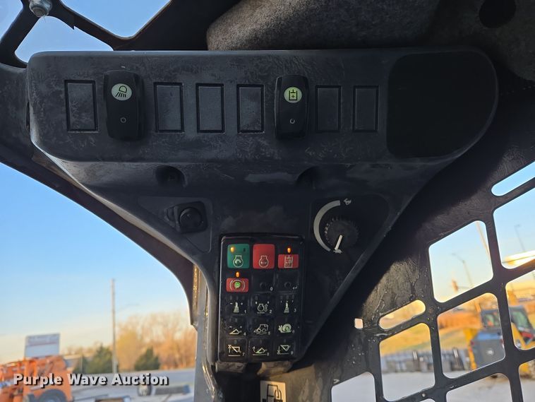 image for item EN8808 2017 John Deere 320E skid steer loader