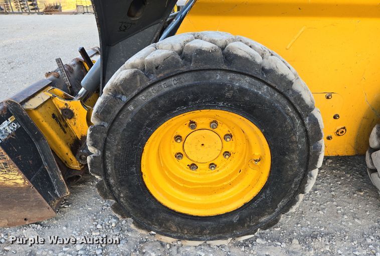 image for item EN8808 2017 John Deere 320E skid steer loader