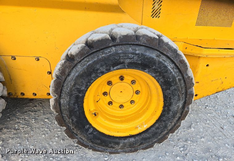 image for item EN8808 2017 John Deere 320E skid steer loader