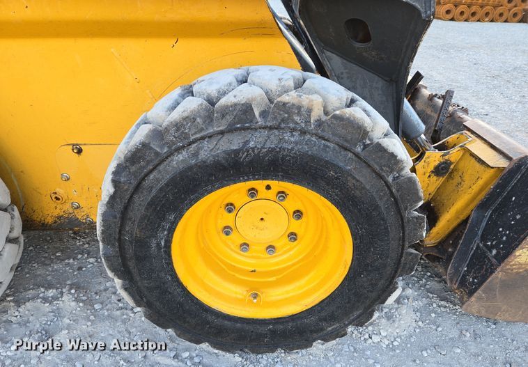 image for item EN8808 2017 John Deere 320E skid steer loader