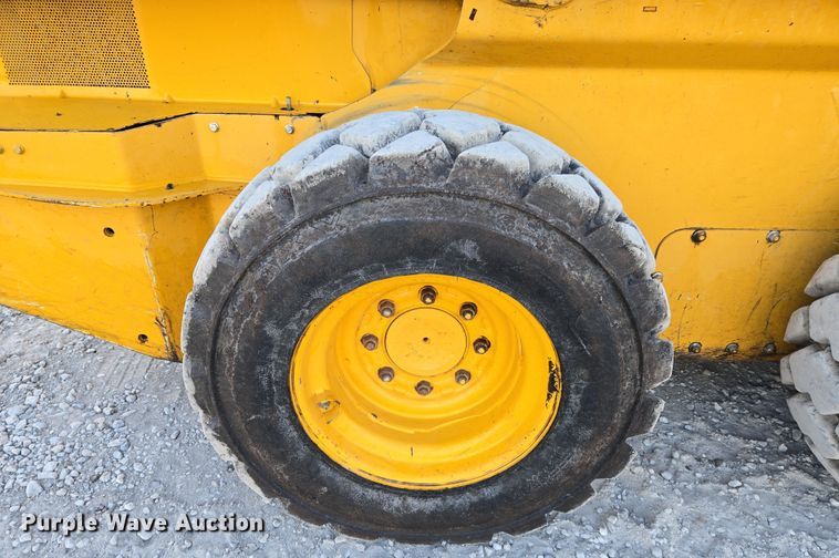 image for item EN8808 2017 John Deere 320E skid steer loader