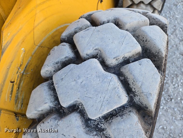 image for item EN8808 2017 John Deere 320E skid steer loader