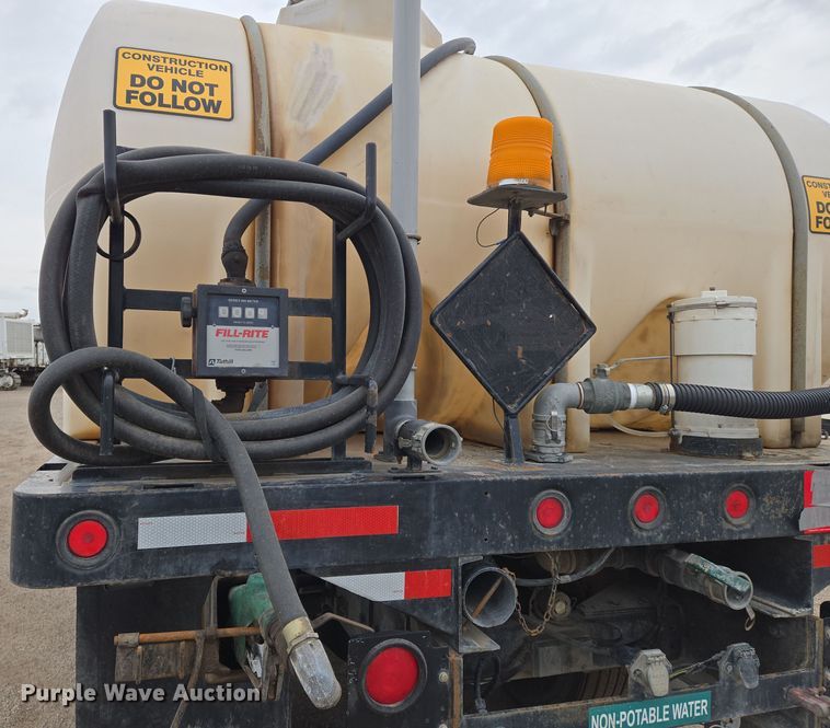 image for item EN8873 1994 White GMC WB water truck