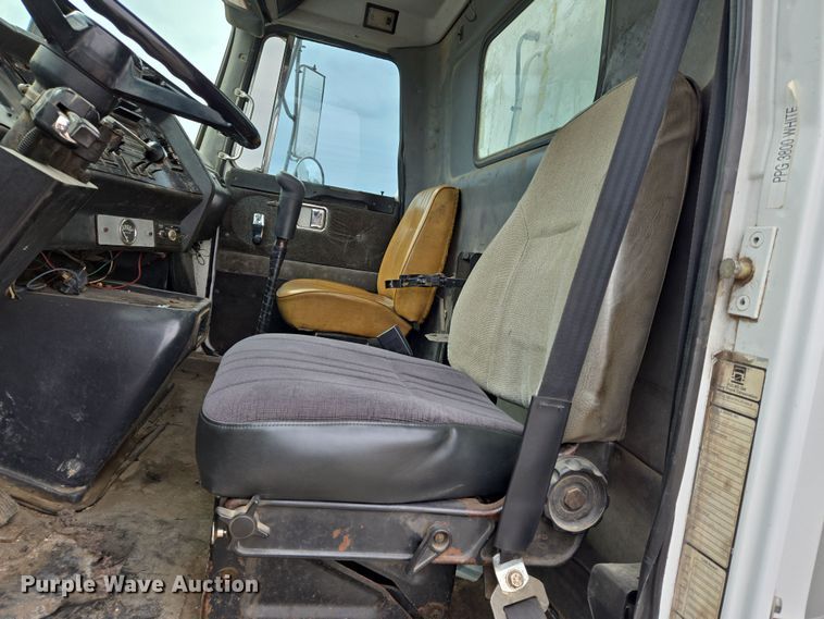 image for item EN8873 1994 White GMC WB water truck