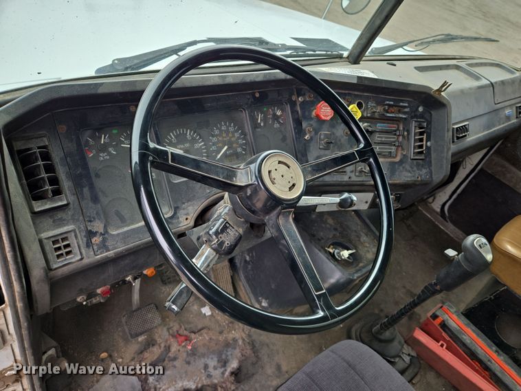 image for item EN8873 1994 White GMC WB water truck