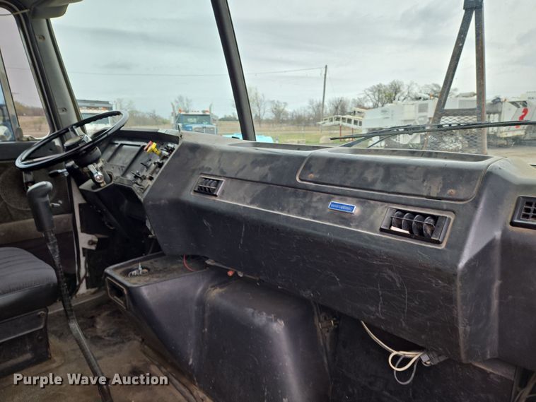 image for item EN8873 1994 White GMC WB water truck