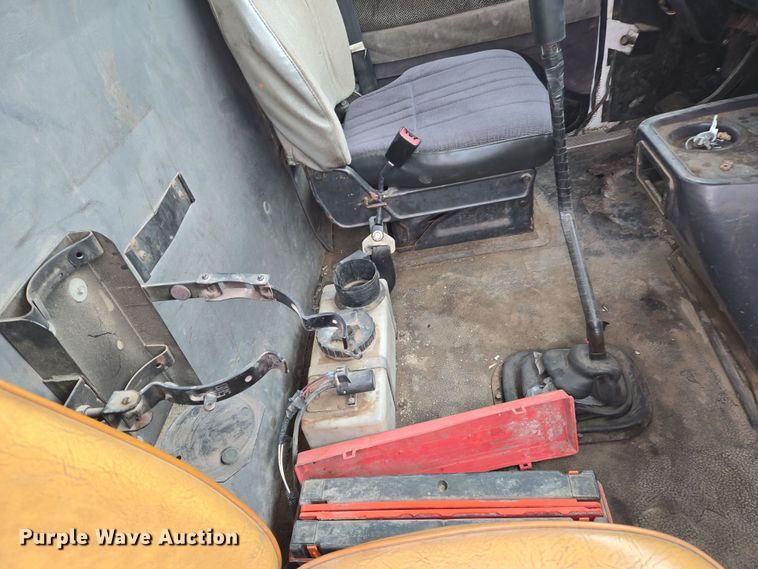 image for item EN8873 1994 White GMC WB water truck