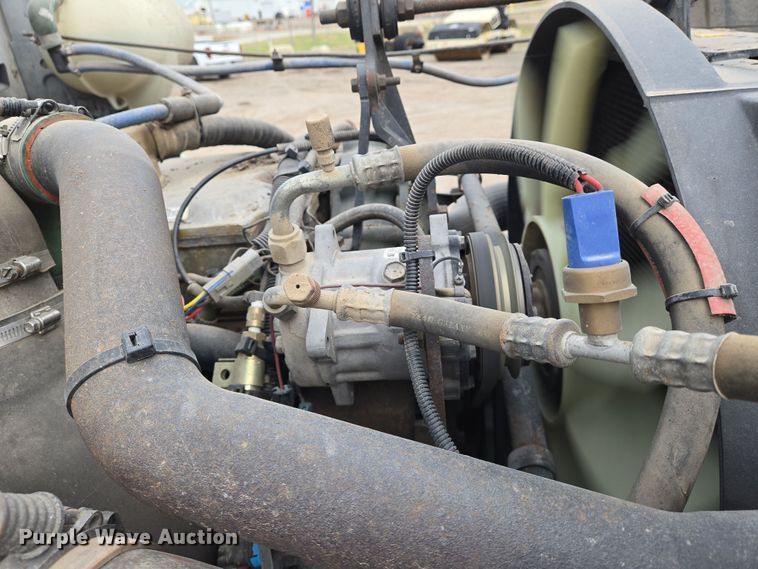 image for item EN8873 1994 White GMC WB water truck