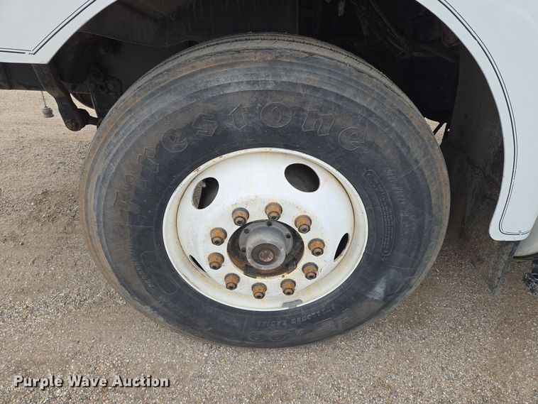 image for item EN8873 1994 White GMC WB water truck