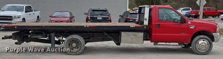 image for item EQ6903 1999 Ford  F550 Super Duty  rollback truck