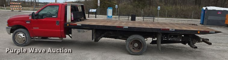 image for item EQ6903 1999 Ford  F550 Super Duty  rollback truck