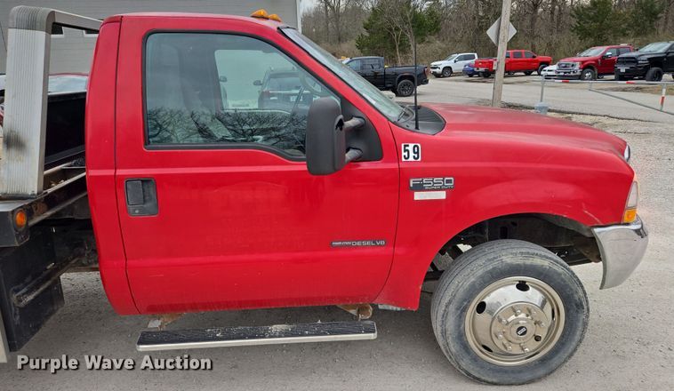 image for item EQ6903 1999 Ford  F550 Super Duty  rollback truck