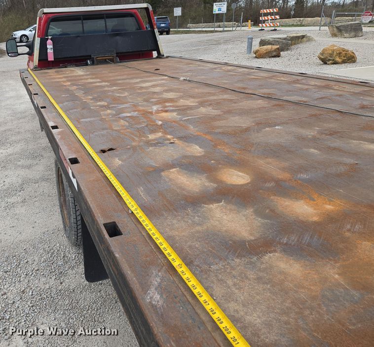 image for item EQ6903 1999 Ford  F550 Super Duty  rollback truck